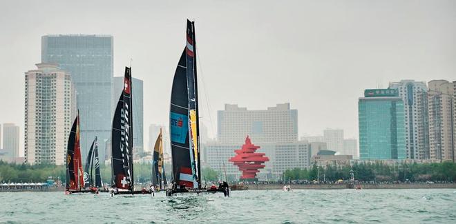 2016 Act 2, Qingdao - The fleet race in front of May Fourth Square – The countdown is on as the teams prepare to take to the water for the second Act of the 2017 Extreme Sailing Series™ in China’s Olympic Sailing City in one week’s time. © Aitor Alcalde Colomer